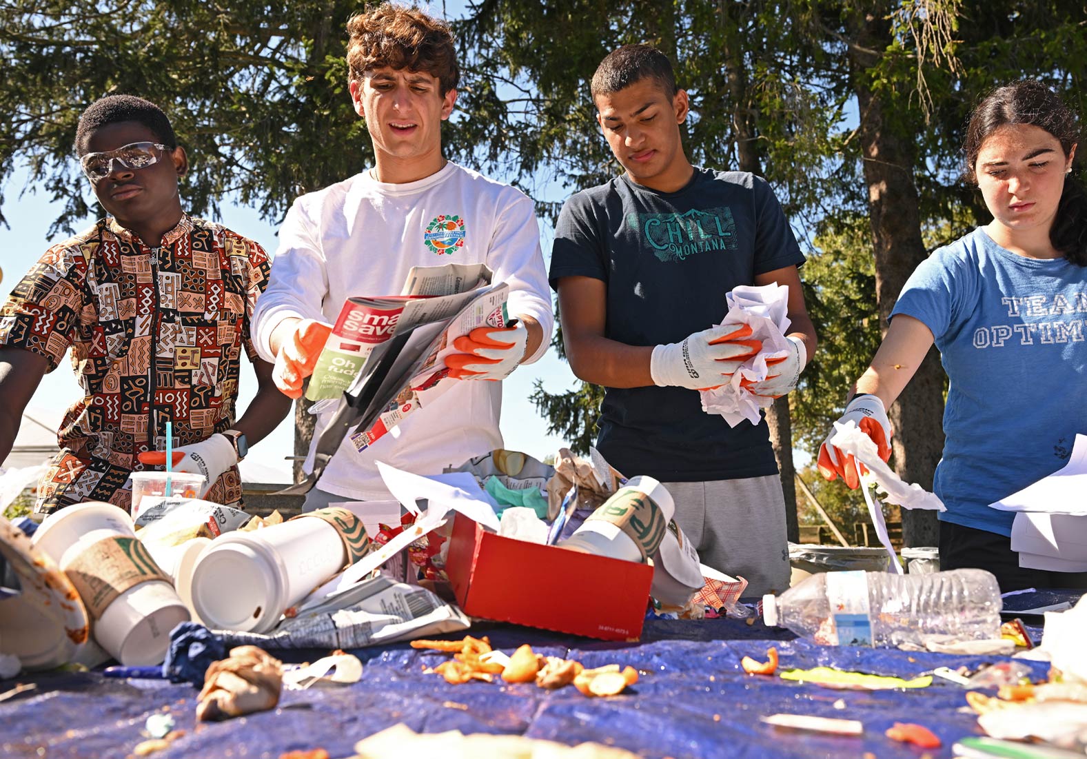 Image of students recycling