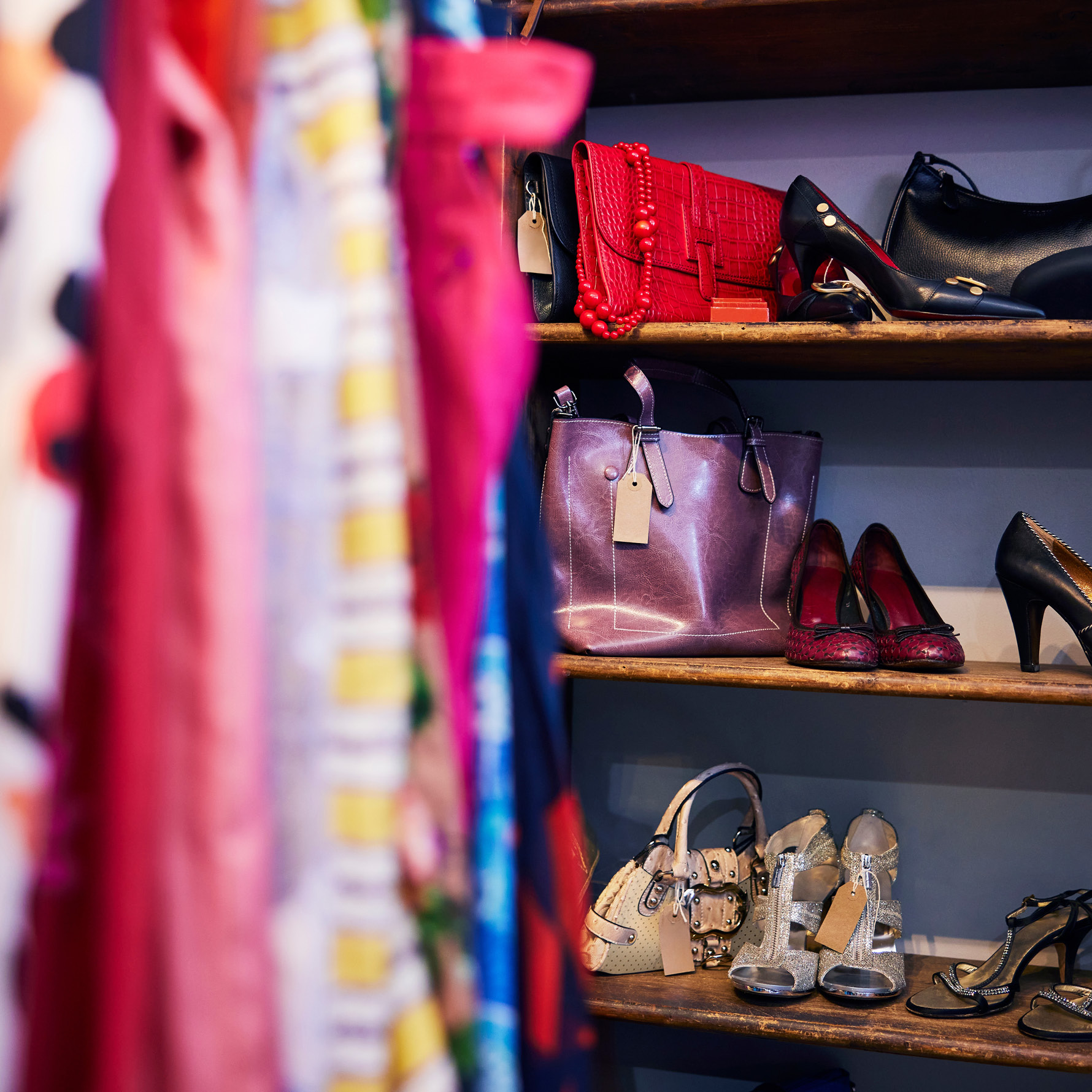 Image of shoes on shelves in a thrift store